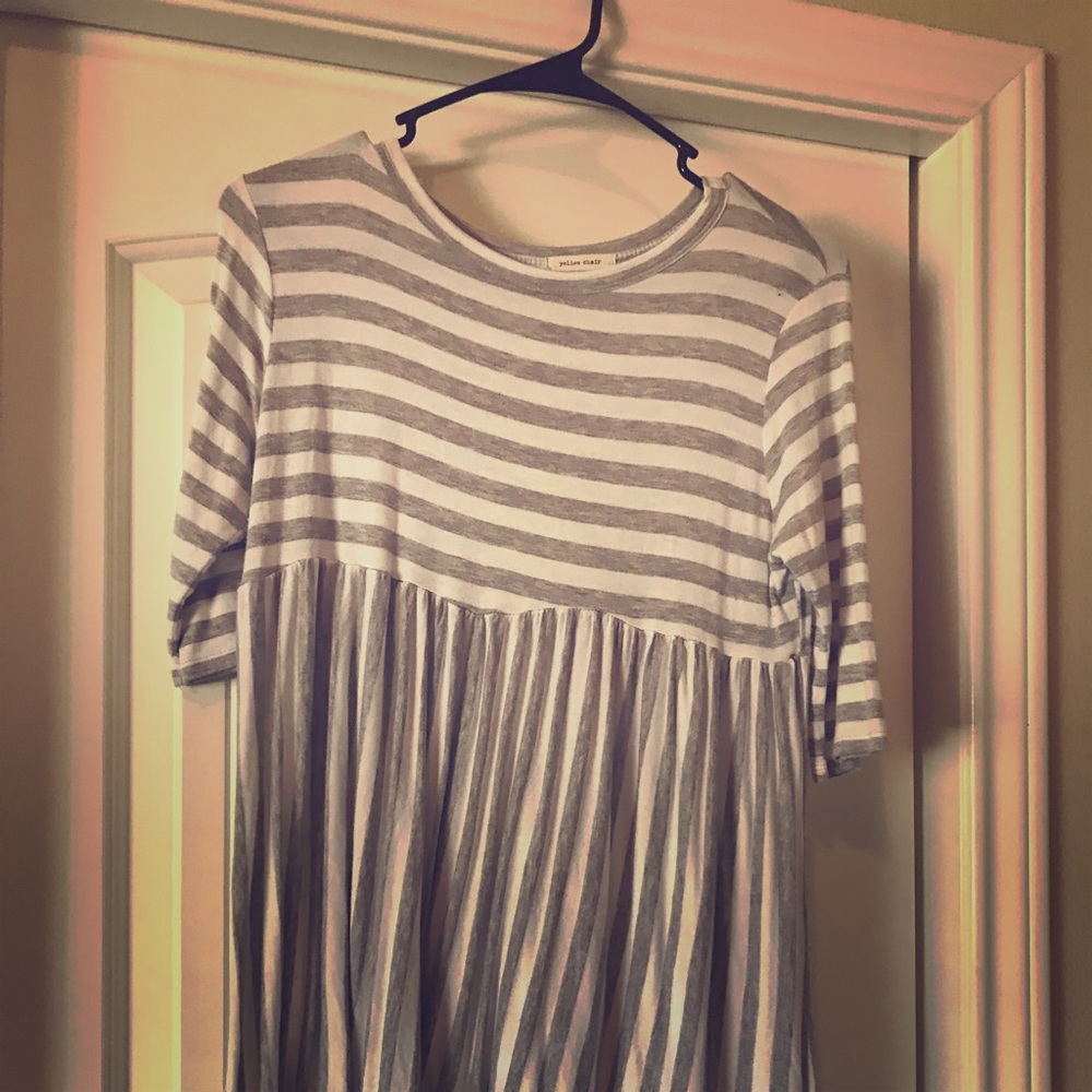 Grey and white striped yellow chair top